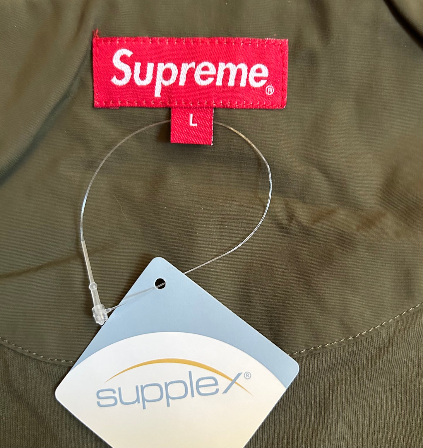 Supreme S Paneled Olive Track Jacket. Size Large