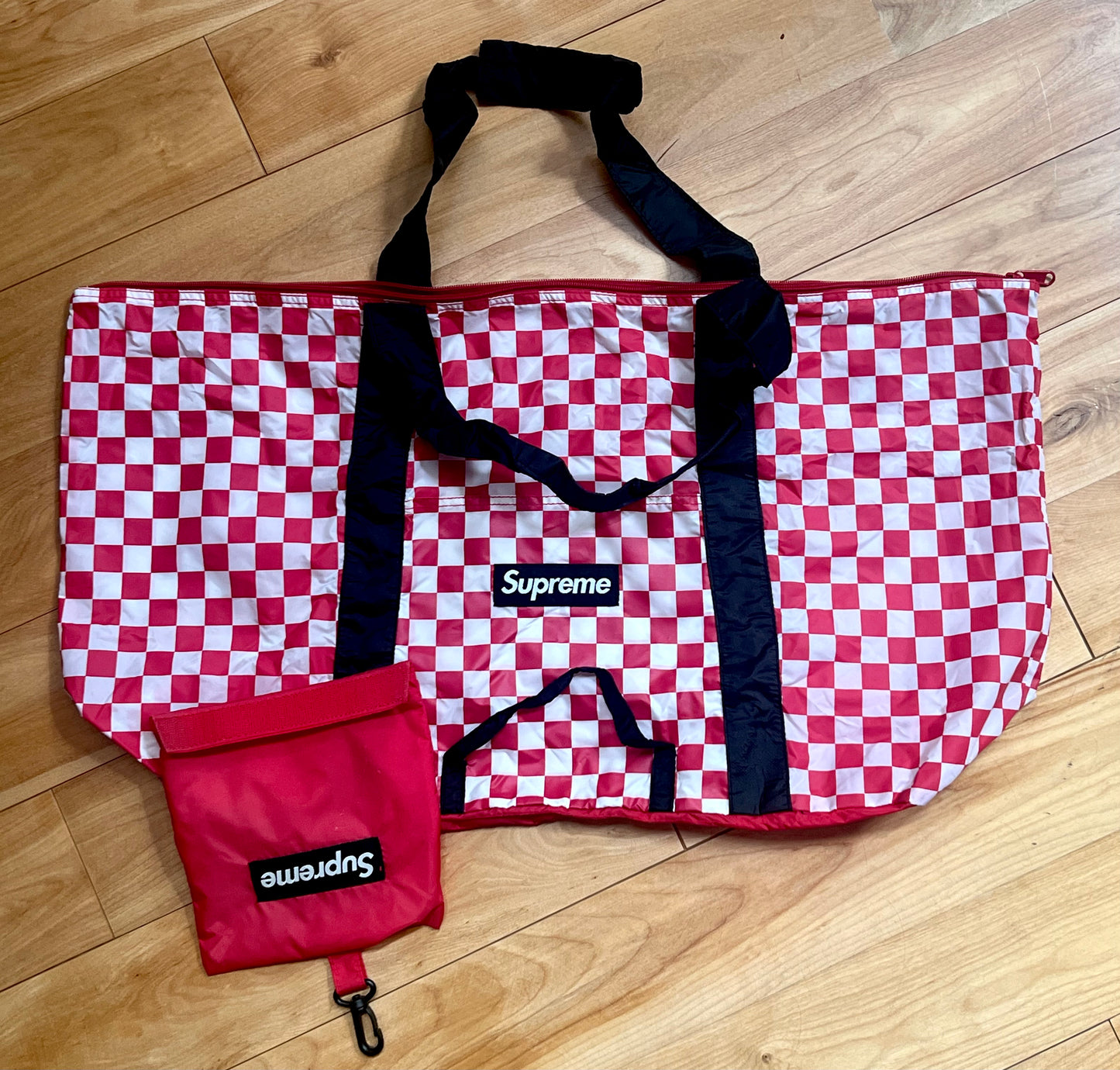 Supreme Red-Checked Nylon Zipper Bag with Stuff Sack